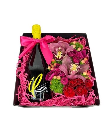Cymbidium Flowers in a box with Bottles of Prosecco