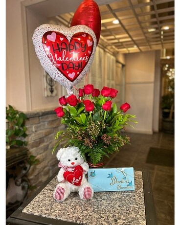 Dozen Rose Package Flower Arrangement
