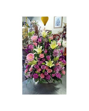 Large arrangement in purple and pink by vivian