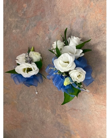Corsage and boutonniere of white lisianthus Corsage