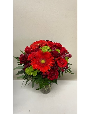 Beautiful mix orange and red flowers in vase Flower Arrangement