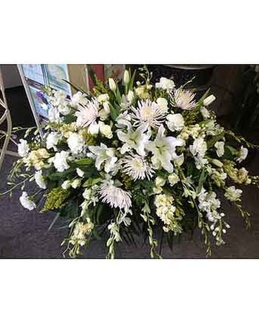 Peaceful White Tribute Casket Spray by Vivian Flower Arrangement