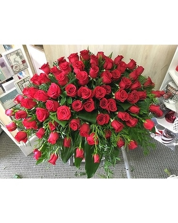 Luxurious Red Rose Casket Spray by Vivian Flower Arrangement