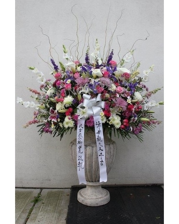 Exotic Pink, Purple, Lavender and White Basket Flower Arrangement