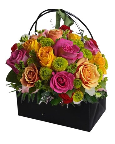 Spring blossom in Handbag Flower Arrangement