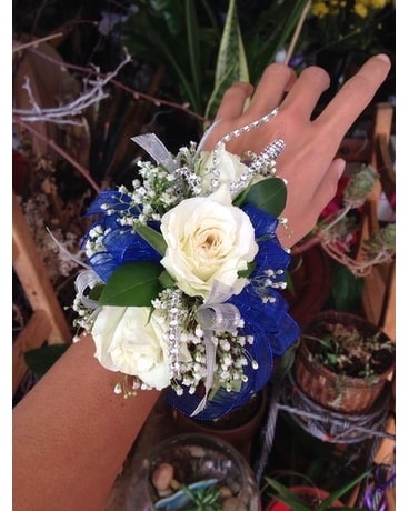 White and Royal blue corsage Flower Arrangement