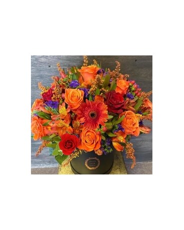 Deferent shade of orange Flower Arrangement