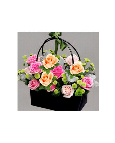 Blush flowers in handbag Flower Arrangement