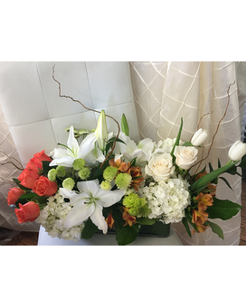 Classy  in white & Orange Flower Arrangement