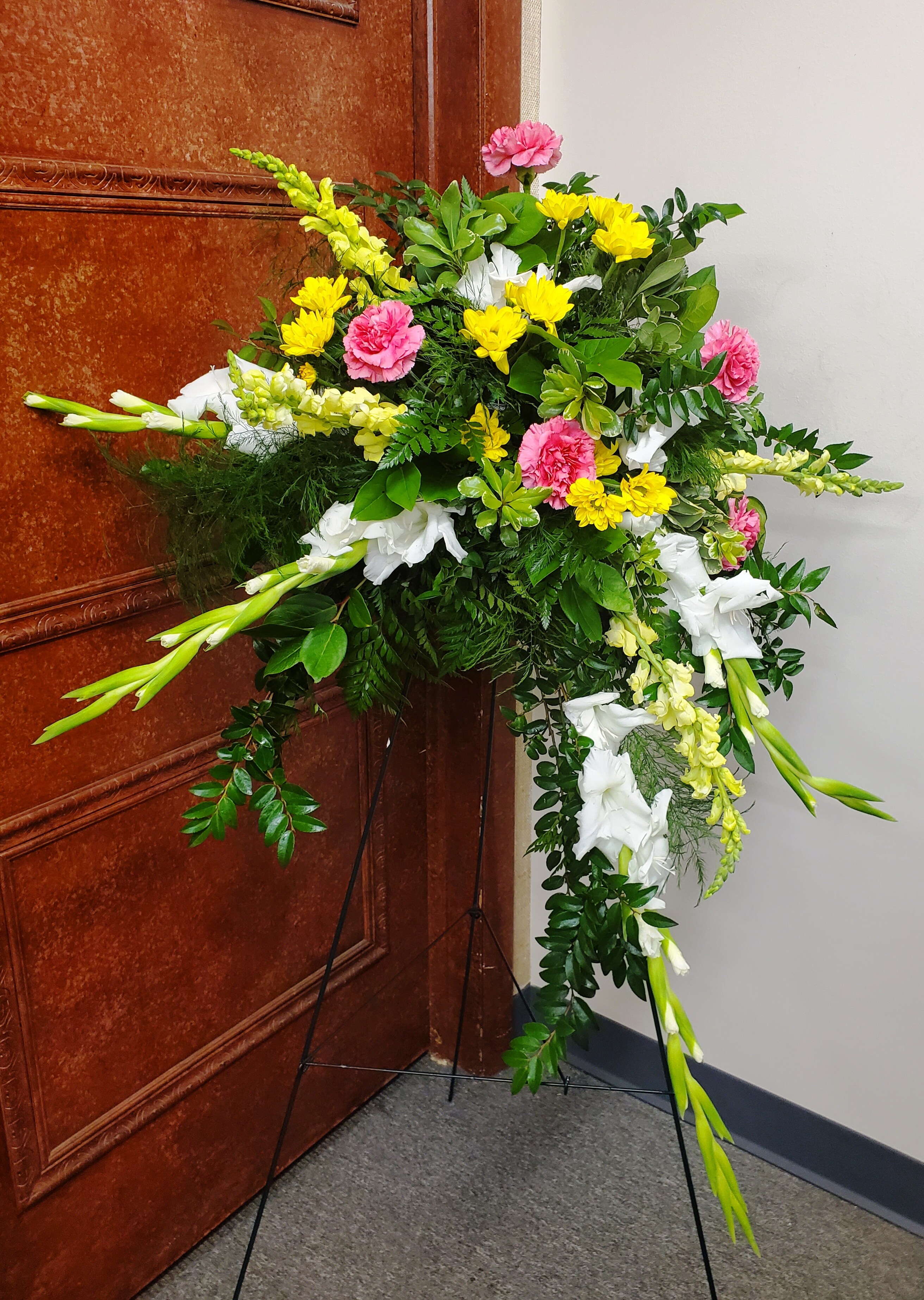 Springtime Crescent Standing Spray Sympathy Arrangement