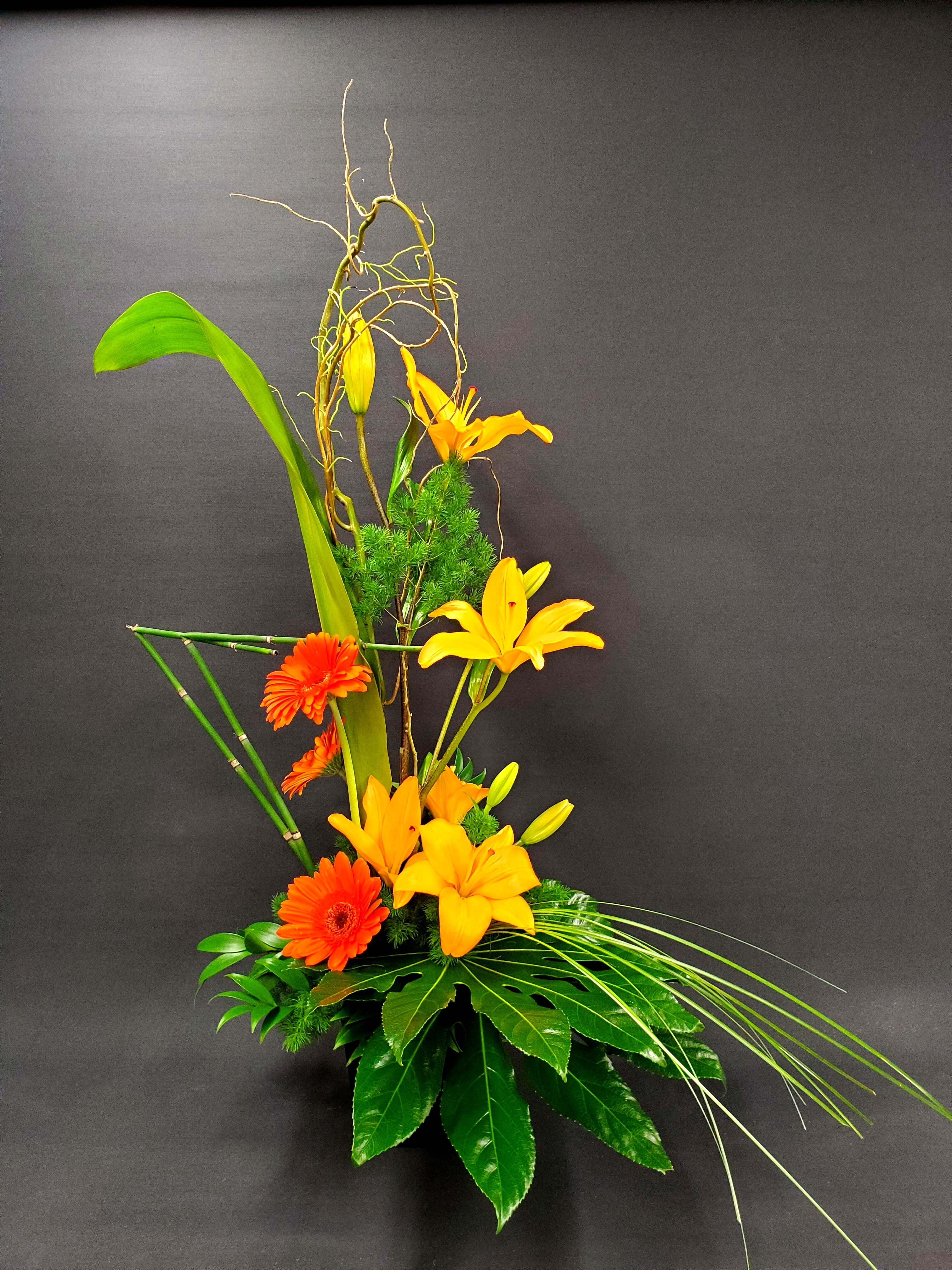Stair-Stepping Lilies Flower Arrangement