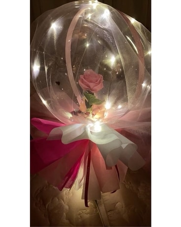 Pink rose in Globe Flower Arrangement