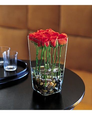Orange Roses with River Rocks Flower Arrangement