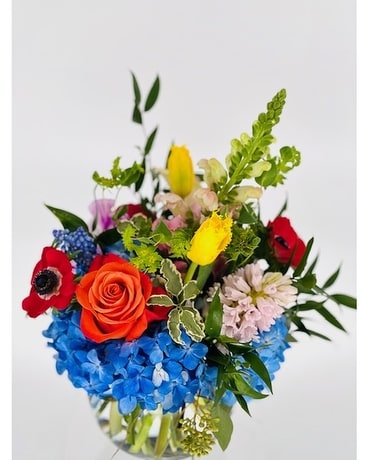 FMS Bubble Vase with Primary colors Flower Arrangement