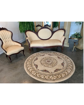 Round Ivory Rug Flower Arrangement