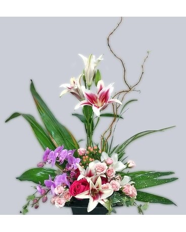 Modern Lillies And Orchids Flower Arrangement