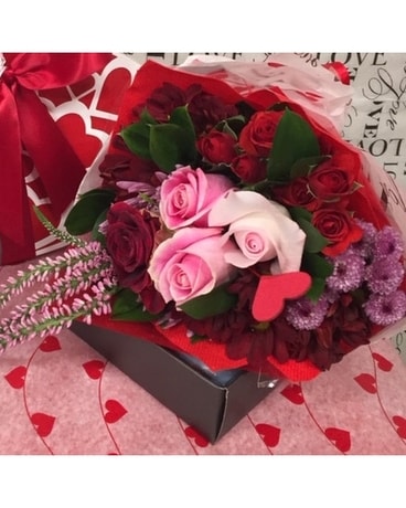 Wrapped In Love Flower Arrangement