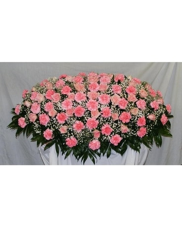 Overhead spray of pink roses and pink carnations Funeral Casket Spray Flowers