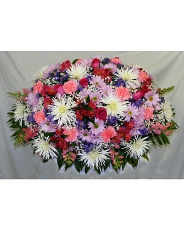 Overhead spray of mixed flowers Funeral Casket Spray Flowers
