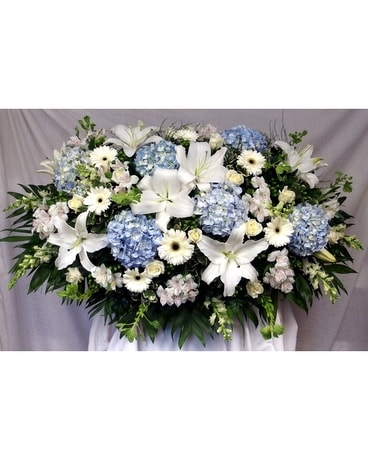 Overhead spray of mixed flowers Funeral Casket Spray Flowers