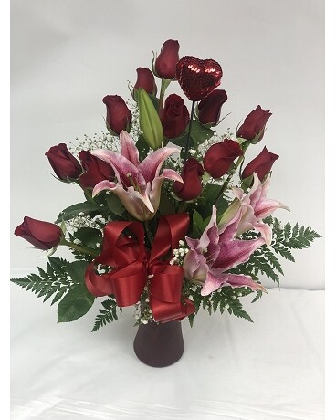 Dz. Roses and Stargazers Flower Arrangement