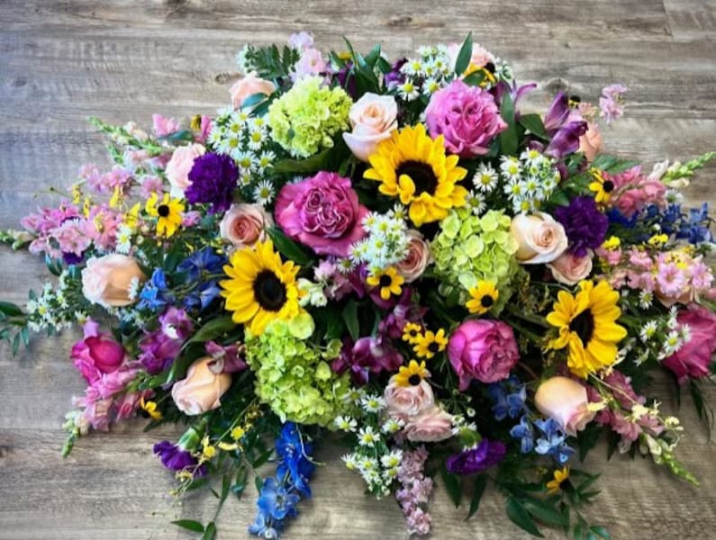 Springtime Tribute Casket Spray Sympathy Arrangement