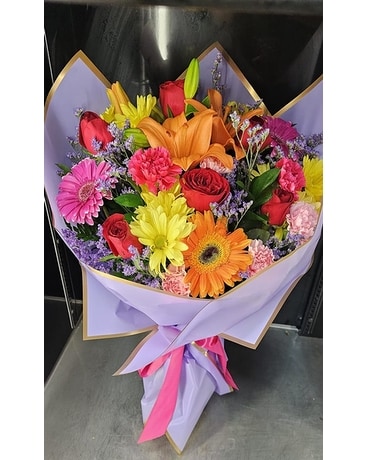 Wrapped Spring Mix Bqt Designers Choice Flower Arrangement