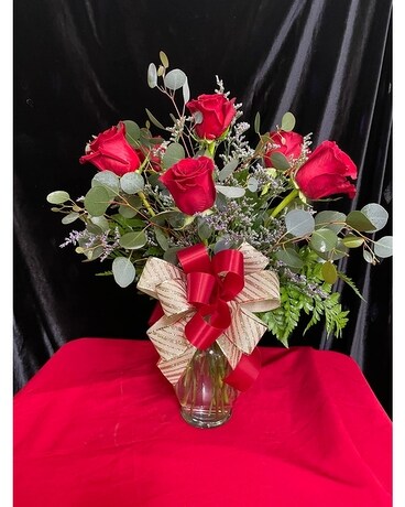 Half dozen red roses