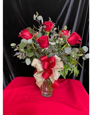 Half dozen red roses