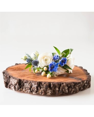 Hint Of Blue Wrist Corsage Flower Arrangement