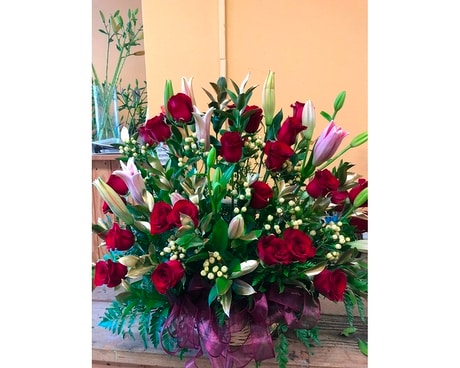 24 RED ROSES IN BASKET (4 LILIES DESIGNER CHOICE) Flower Arrangement