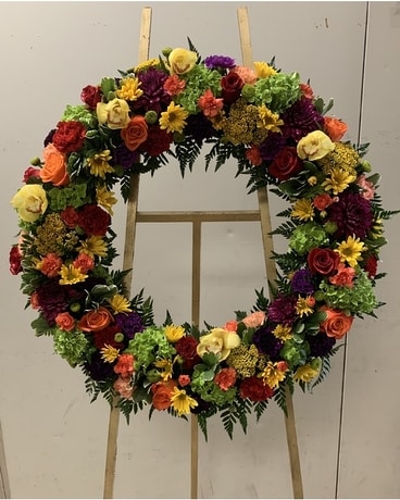 Jewel tone wreath Funeral Arrangement