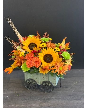 Wagon Full of Fall Flower Arrangement
