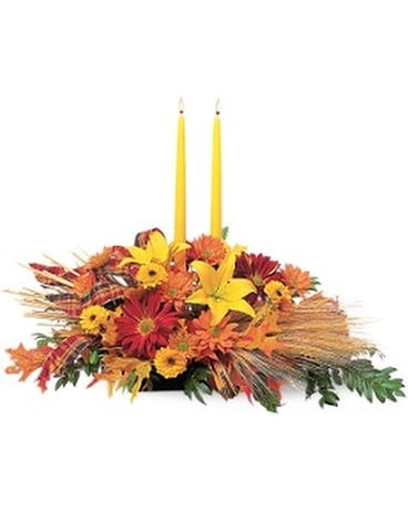 Centerpiece with Tapers Flower Arrangement