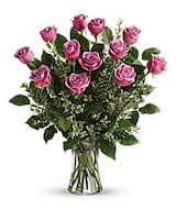 Dozen Lavender Roses Vased Deluxe - 12 Lavender Roses vased with extra filler flowers size,  inches height and  inches wide.