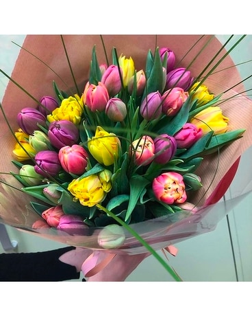 Mixed cut tulips wrapped Flower Arrangement