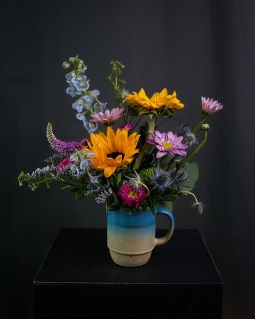 Cup Of Cheer Flower Arrangement