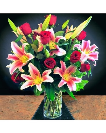 Stargazers with red roses Flower Arrangement