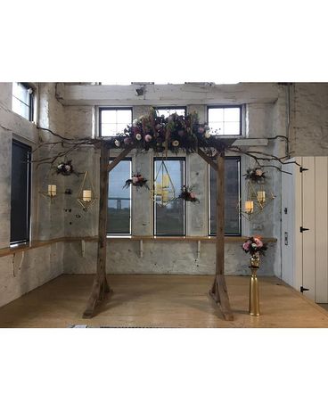 Purple Ceremony Wedding Arrangement
