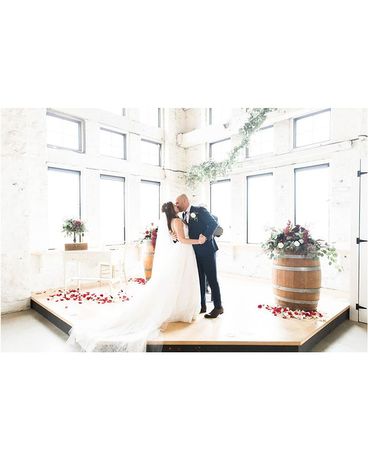Burgundy, White & Greenery Ceremony Wedding Arrangement