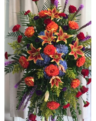 Splendid Sunset Spray Funeral Arrangement