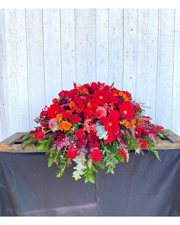 Vibrant Red Casket Spray Flower Arrangement