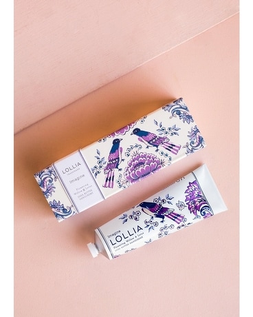 Imagine Shea Butter Handcreme size,  inches height and  inches wide.