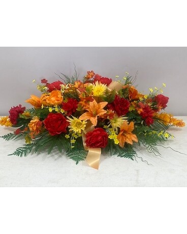 Tranquil Fall Cemetery Saddle Flower Arrangement