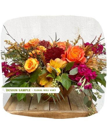 Centerpiece - In Unique Container Flower Arrangement