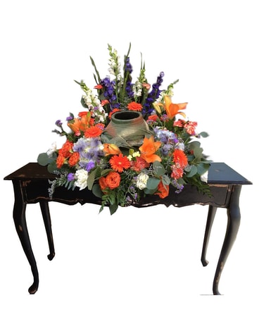 Urn Wreath In Oranges, Purples, Blues & Whites Flower Arrangement