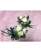 Corsage & Boutonniere size,  inches height and  inches wide.