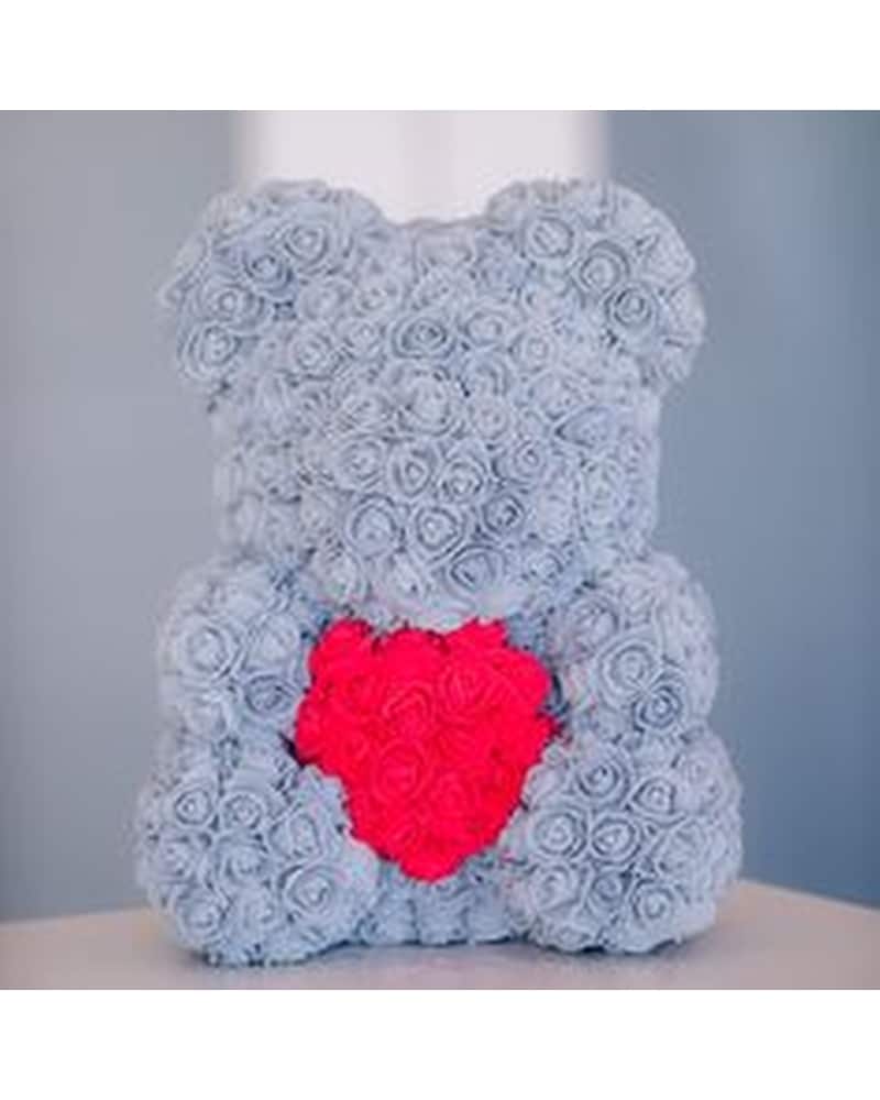 Faux roses top teddy bear
