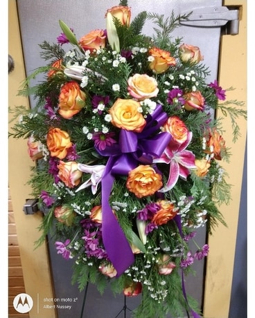 Fresh Rose and lily easel spray Funeral Arrangement