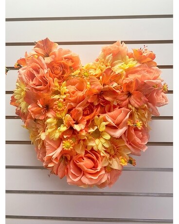 Peach and Yellow Heart Standing Spray Funeral Arrangement